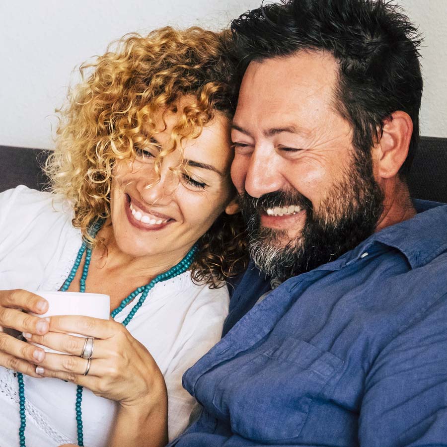 Couple embracing smiling